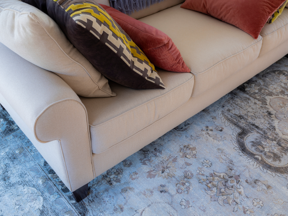 How to Keep an Area Rug from Bunching Up on Carpet